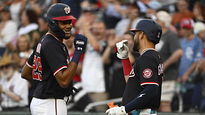 Apr 23, 2025; Washington, District of Columbia, USA; Washington Nationals outfielder James Wood (29) is congratulated by Washington Nationals second base Luis García Jr. (2) after hitting a solo home run against the Baltimore Orioles during the first inning at Nationals Park