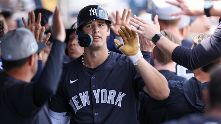 New York Yankees outfielder Spencer Jones celebrates after hitting a three-run home run against the Philadelphia Phillies during a spring training game at BayCare Ballpark.