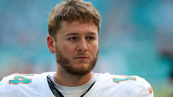 Miami Dolphins quarterback Quinn Ewers (14) looks on before a game against the New England Patriots at Hard Rock Stadium.