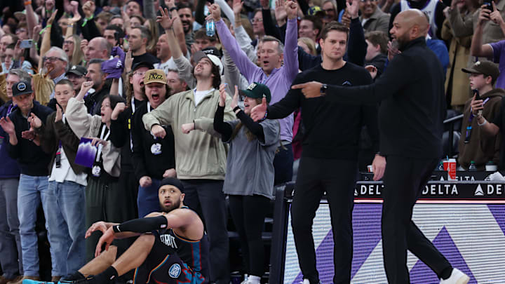 Dec 26, 2025; Salt Lake City, Utah, USA; Utah Jazz head coach Will Hardy and Detroit Pistons head coach J.B. Bickerstaff (right) react after the game at Delta Center. Mandatory Credit: Rob Gray-Imagn Images