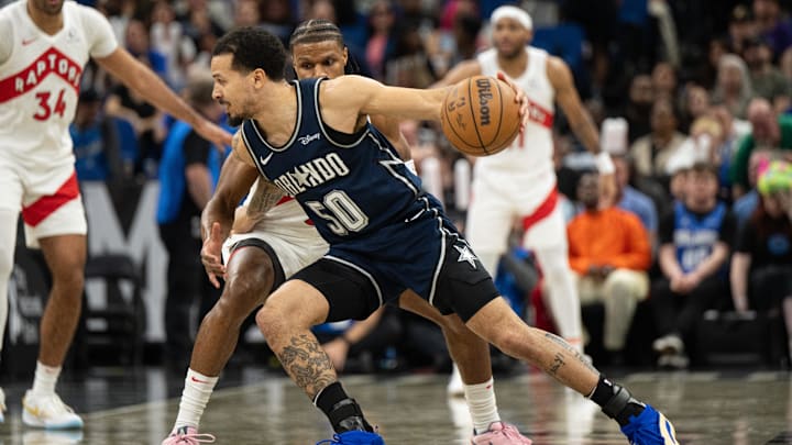Orlando Magic guard Cole Anthony (50) dribbles the ball against the Toronto Raptors in the fourth quarter at KIA Center.