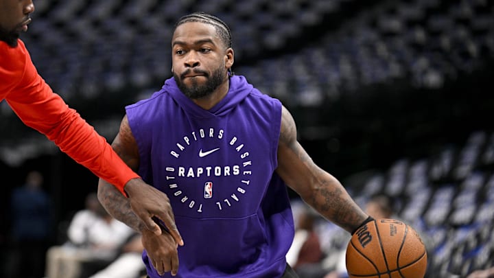 Apr 11, 2025; Dallas, Texas, USA; Toronto Raptors guard Jamal Shead (23) warms up before the game against the Dallas Mavericks at the American Airlines Center. Mandatory Credit: Jerome Miron-Imagn Images