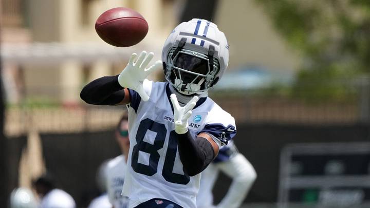 Dallas Cowboys receiver Traeshon Holden (80) catches the ball wearing a Guardian helmet cap at training camp at River Ridge Playing Fields. Mandatory Credit: Kirby Lee-Imagn Images Dallas Cowboys receiver Traeshon Holden (80) catches the ball wearing a Guardian helmet cap at training camp at River Ridge Playing Fields. Mandatory Credit: Kirby Lee-Imagn Images