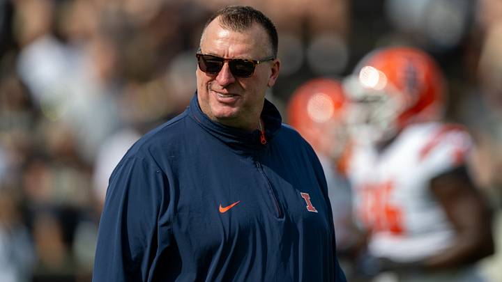 Oct 4, 2025; West Lafayette, Indiana, USA; Illinois Fighting Illini head coach Bret Bielema watches warm ups before the game against the Purdue Boilermakers at Ross-Ade Stadium. Mandatory Credit: Marc Lebryk-Imagn Images