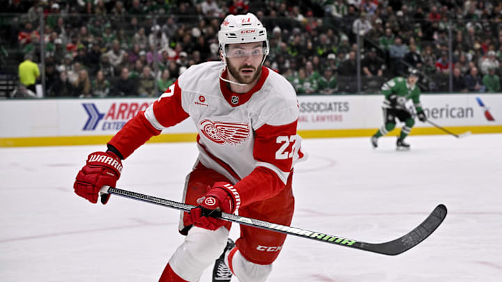 Jan 19, 2025; Dallas, Texas, USA; Detroit Red Wings center Michael Rasmussen (27) chases the puck in the Dallas Stars zone during the first period at the American Airlines Center. Mandatory Credit: Jerome Miron-Imagn Images