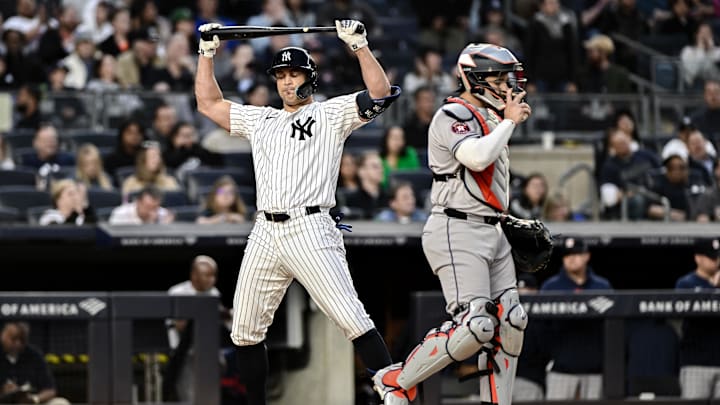 May 9, 2024; Bronx, New York, USA; New York Yankees designated hitter Giancarlo Stanton (27) reacts after striking out against the Houston Astros during the eighth inning at Yankee Stadium.
