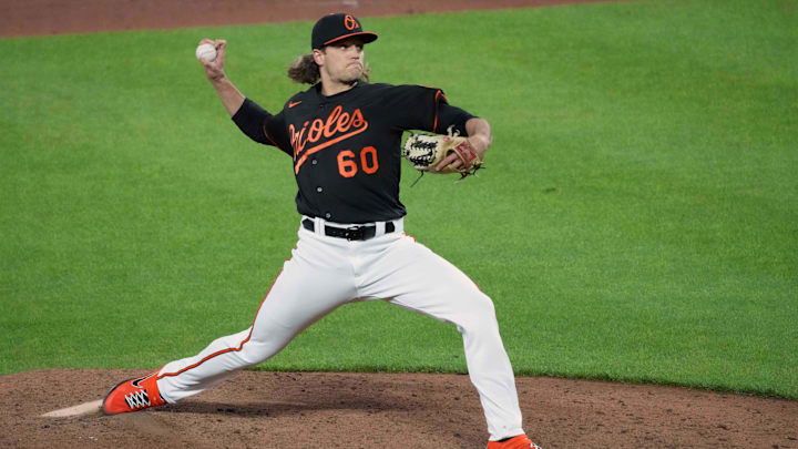 May 7, 2021; Baltimore, Maryland, USA; Baltimore Orioles pitcher Isaac Mattson (60) pitches during the ninth inning against the Boston Red Sox at Oriole Park at Camden Yards. Mandatory Credit: Mitch Stringer-Imagn Images