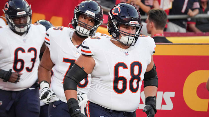 Aug 22, 2024; Kansas City, Missouri, USA; Chicago Bears center Doug Kramer Jr. (68) runs onto the field against the Kansas City Chiefs prior to a game at GEHA Field at Arrowhead Stadium.