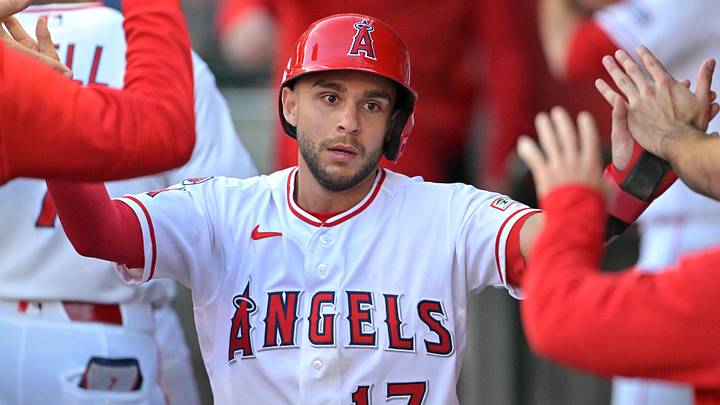 Jun 8, 2026; Anaheim, California, USA;  Los Angeles Angels third baseman Nick Madrigal (17) is greeted in the dugout after scoring a run in the second inning against the Houston Astros at Angel Stadium. Mandatory Credit: Jayne Kamin-Oncea-Imagn Images