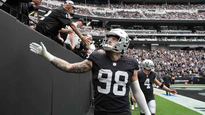 Oct 23, 2022; Paradise, Nevada, USA; Las Vegas Raiders defensive end Maxx Crosby (98) greets fans before the game against the Houston Texans at Allegiant Stadium. Mandatory Credit: Kirby Lee-Imagn Images