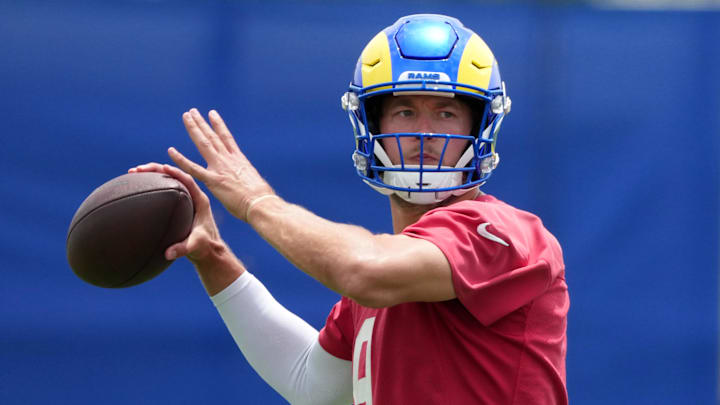 Jun 3, 2025; Woodland Hills, CA, USA; Los Angeles Rams quarterback Matthew Stafford (9) throws the ball during organized team activities at Rams Practice Facility. Mandatory Credit: Kirby Lee-Imagn Images