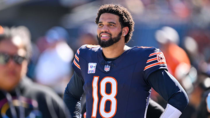 Oct 6, 2024; Chicago, Illinois, USA; Chicago Bears quarterback Caleb Williams (18) looks on from the sideline against the Carolina Panthers during the third quarter at Soldier Field. Mandatory Credit: Daniel Bartel-Imagn Images