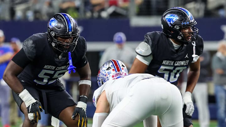 North Crowley's John Turntine III, right, announced he will play at Texas during a ceremony on July 4. He's one of the top returning offensive linemen.