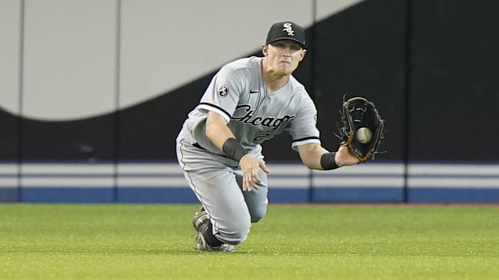 Chicago White Sox left fielder Andrew Vaughn (25) makes a catch off of a fly ball by Toronto Blue Jays first baseman Lourdes Gurriel Jr. (not pictured) in the fifth inning at Rogers Centre. Mandatory Credit: John E. Sokolowski-Imagn Images