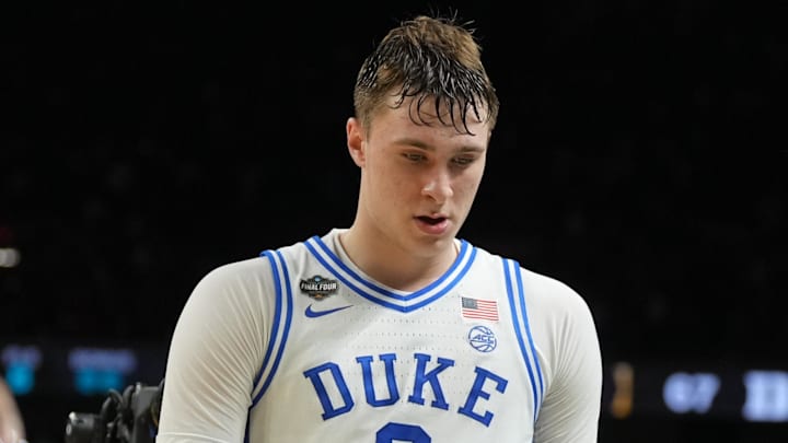 Apr 5, 2025; San Antonio, TX, USA; Duke Blue Devils forward Cooper Flagg (2) walks off the court after losing to the Houston Cougars in the semifinals of the men's Final Four of the 2025 NCAA Tournament at the Alamodome. Mandatory Credit: Robert Deutsch-Imagn Images