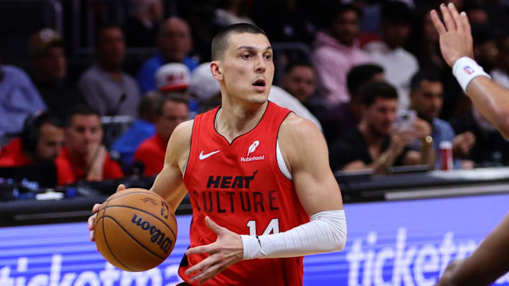 Nov 18, 2024; Miami, Florida, USA; Miami Heat guard Tyler Herro (14) drives to the basket against the Philadelphia 76ers during the third quarter at Kaseya Center. Mandatory Credit: Sam Navarro-Imagn Images