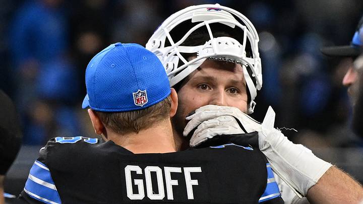 Dec 15, 2024; Detroit, Michigan, USA; Buffalo Bills quarterback Josh Allen (17) exchanges words with Detroit Lions quarterback Jared Goff (16) following their win over the Lions at Ford Field. Mandatory Credit: Lon Horwedel-Imagn Images