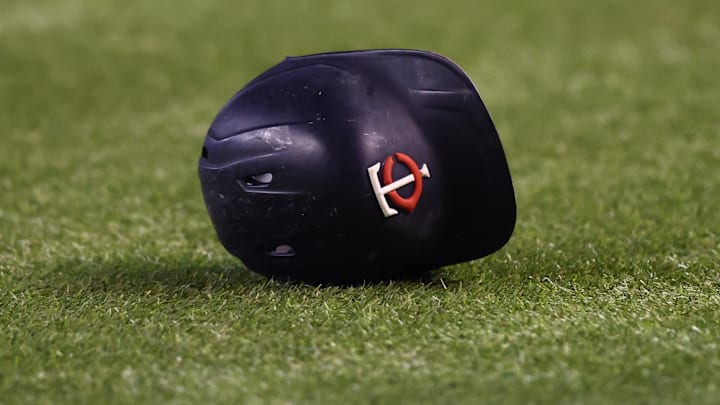 Jun 17, 2022; Phoenix, Arizona, USA; Detailed view of a Minnesota Twins batting helmet on the field against the Arizona Diamondbacks at Chase Field. Mandatory Credit: Mark J. Rebilas-Imagn Images Jun 17, 2022; Phoenix, Arizona, USA; Detailed view of a Minnesota Twins batting helmet on the field against the Arizona Diamondbacks at Chase Field. Mandatory Credit: Mark J. Rebilas-Imagn Images
