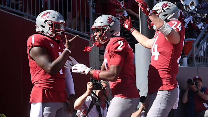 Sep 16, 2023; Pullman, Washington, USA; Washington State Cougars quarterback Cameron Ward (1) celebrates with wide receiver Kyle Williams (2) after a score against the Northern Colorado Bears in the first half at Gesa Field at Martin Stadium. Mandatory Credit: James Snook-Imagn Images Sep 16, 2023; Pullman, Washington, USA; Washington State Cougars quarterback Cameron Ward (1) celebrates with wide receiver Kyle Williams (2) after a score against the Northern Colorado Bears in the first half at Gesa Field at Martin Stadium. Mandatory Credit: James Snook-Imagn Images