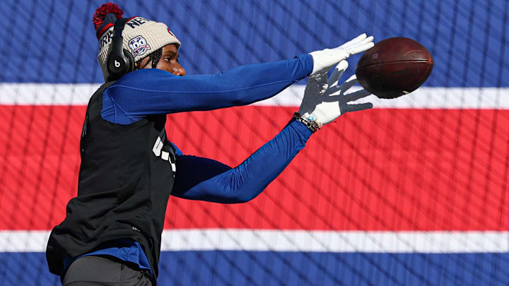 Nov 3, 2024; East Rutherford, New Jersey, USA; New York Giants wide receiver Malik Nabers (1) warms up before the game against the Washington Commanders at MetLife Stadium.  