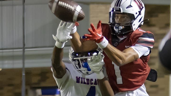 Temple Wildcats center back Jason Bradford deflects the pass intended for Weiss Wolves wide receiver Adrian Wilson (1) during the second quarter at the District 12-6A football game on Friday, Sept 29,20 2023, at the Pfield Stadium - Pflugerville, TX.