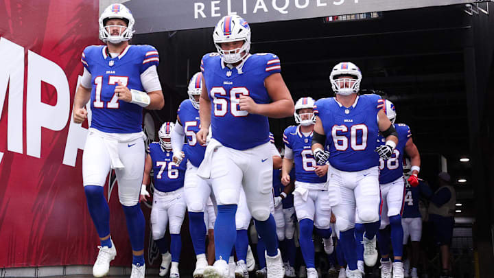 Buffalo Bills QB Josh Allen leads the team onto the field for warm-ups before a game against the Tampa Bay Buccaneers.