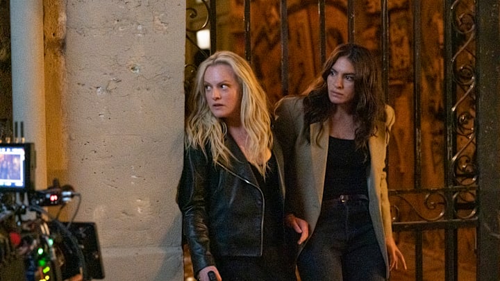The Veil, FX on Hulu -- Pictured (L-R): Elisabeth Moss as Imogen Salter, Yumna Marwan as Adilah El Idrissi. CR: Christine Tamalet/FX