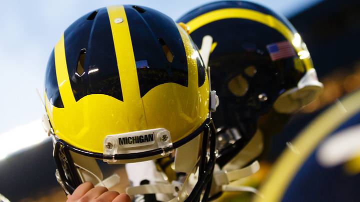 October 20, 2012; Ann Arbor, MI, USA; Michigan Wolverines players hold up their helmets after the game against the Michigan State Spartans at Michigan Stadium. Mandatory Credit: Rick Osentoski-USA TODAY Sports October 20, 2012; Ann Arbor, MI, USA; Michigan Wolverines players hold up their helmets after the game against the Michigan State Spartans at Michigan Stadium. Mandatory Credit: Rick Osentoski-USA TODAY Sports
