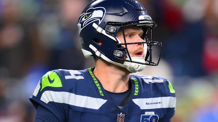 Seattle Seahawks quarterback Sam Darnold (14) looks to throw a pass during the first quarter against the Houston Texans at Lumen Field.