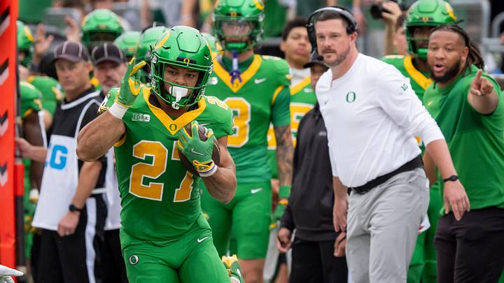 Jayden Limar carries the ball for Oregon in a 69-3 rout of Oklahoma State. Jayden Limar carries the ball for Oregon in a 69-3 rout of Oklahoma State.