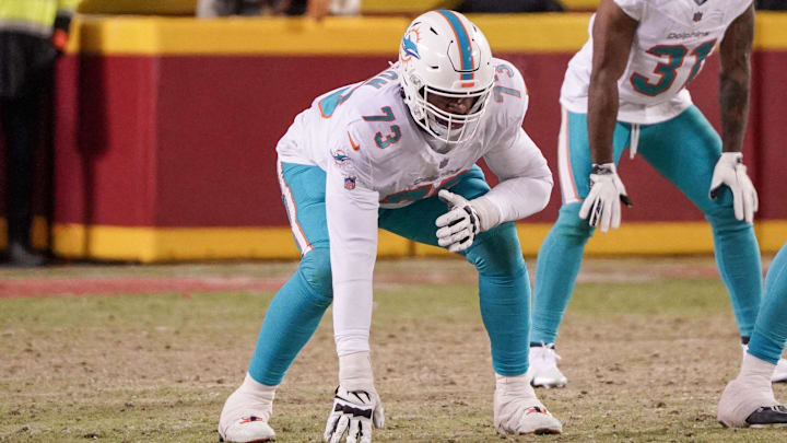 Miami Dolphins tackle Austin Jackson (73) at the line of scrimmage against the Kansas City Chiefs in a 2024 AFC wild card game at GEHA Field at Arrowhead Stadium.
