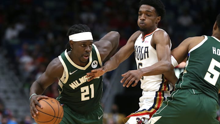 Dec 17, 2021; New Orleans, Louisiana, USA; Milwaukee Bucks guard Jrue Holiday (21) drives around New Orleans Pelicans forward Herbert Jones (5) in the second half at the Smoothie King Center. Mandatory Credit: Chuck Cook-Imagn Images Dec 17, 2021; New Orleans, Louisiana, USA; Milwaukee Bucks guard Jrue Holiday (21) drives around New Orleans Pelicans forward Herbert Jones (5) in the second half at the Smoothie King Center. Mandatory Credit: Chuck Cook-Imagn Images