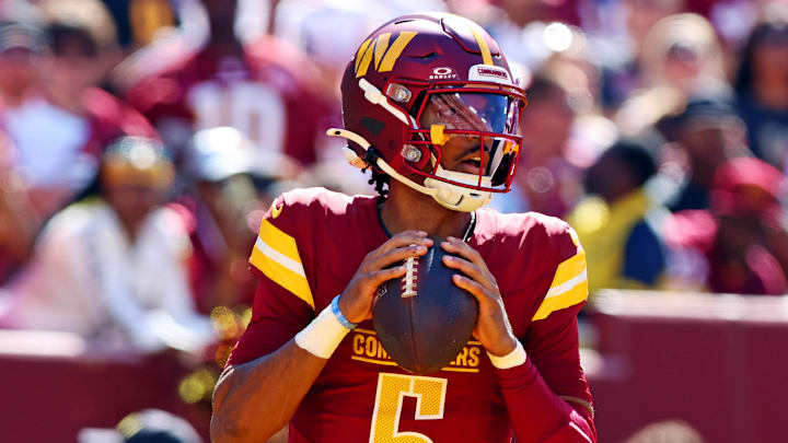 Oct 6, 2024; Landover, Maryland, USA; Washington Commanders quarterback Jayden Daniels (5) drops back to pass during the third quarter against the Cleveland Browns at NorthWest Stadium. Mandatory Credit: Peter Casey-Imagn Images Oct 6, 2024; Landover, Maryland, USA; Washington Commanders quarterback Jayden Daniels (5) drops back to pass during the third quarter against the Cleveland Browns at NorthWest Stadium. Mandatory Credit: Peter Casey-Imagn Images