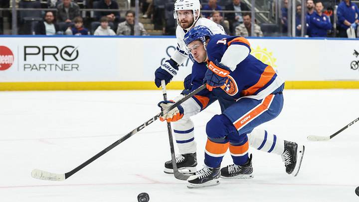 Apr 9, 2026; Elmont, New York, USA; Toronto Maple Leafs defenseman Oliver Ekman-Larsson (95) and New York Islanders center Mathew Barzal (13) battle for control of the puck in the second period at UBS Arena. Mandatory Credit: Wendell Cruz-Imagn Images Apr 9, 2026; Elmont, New York, USA; Toronto Maple Leafs defenseman Oliver Ekman-Larsson (95) and New York Islanders center Mathew Barzal (13) battle for control of the puck in the second period at UBS Arena. Mandatory Credit: Wendell Cruz-Imagn Images
