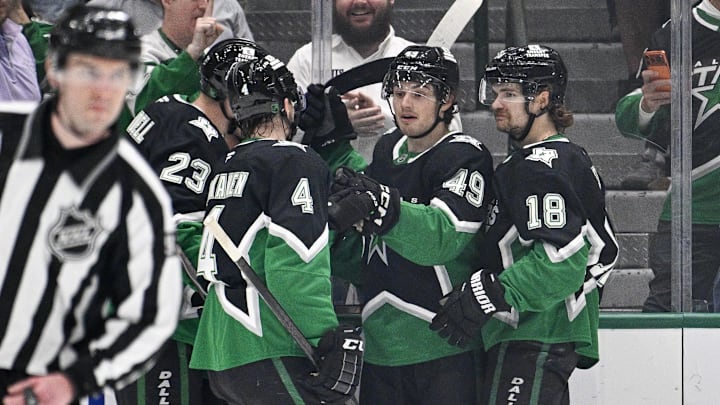 Mar 22, 2026; Dallas, Texas, USA; Dallas Stars center Colin Blackwell (15) and center Sam Steel (18) and center Justin Hryckowian (49) and defenseman Miro Heiskanen (4) celebrates a goal scored by Hryckowian against the Vegas Golden Knights during the first period at the American Airlines Center. Mandatory Credit: Jerome Miron-Imagn Images Mar 22, 2026; Dallas, Texas, USA; Dallas Stars center Colin Blackwell (15) and center Sam Steel (18) and center Justin Hryckowian (49) and defenseman Miro Heiskanen (4) celebrates a goal scored by Hryckowian against the Vegas Golden Knights during the first period at the American Airlines Center. Mandatory Credit: Jerome Miron-Imagn Images
