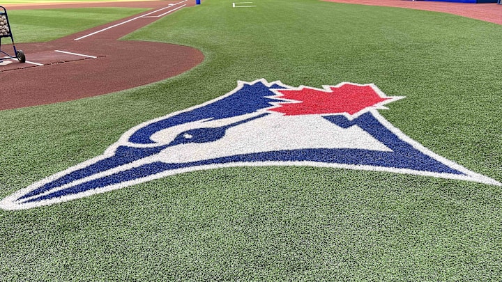 Aug 14, 2022; Toronto, Ontario, CAN; The Toronto Blue Jays logo during batting practice against the Cleveland Guardians at Rogers Centre. Mandatory Credit: Nick Turchiaro-Imagn Images Aug 14, 2022; Toronto, Ontario, CAN; The Toronto Blue Jays logo during batting practice against the Cleveland Guardians at Rogers Centre. Mandatory Credit: Nick Turchiaro-Imagn Images