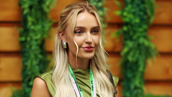 American influencer Morgan Riddle poses before the Miami Grand Prix at Miami International Autodrome.