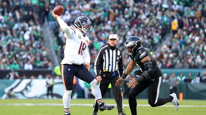 Caleb Williams throws the ball against the Eagles Caleb Williams throws the ball against the Eagles