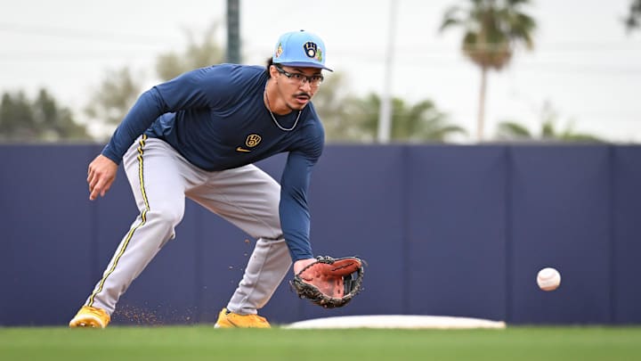 Milwaukee Brewers infielder David Hamilton fields a grounder during spring training workouts Monday, February 16, 2026, at American Family Fields of Phoenix in Phoenix, Arizona.