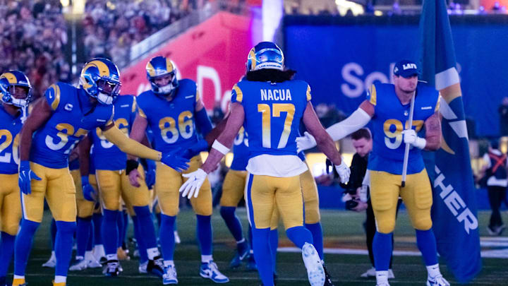 Jan 13, 2025; Glendale, AZ, USA; Los Angeles Rams wide receiver Puka Nacua (17) greets teammates prior to the game against the Minnesota Vikings in an NFC wild card game at State Farm Stadium. Mandatory Credit: Mark J. Rebilas-Imagn Images Jan 13, 2025; Glendale, AZ, USA; Los Angeles Rams wide receiver Puka Nacua (17) greets teammates prior to the game against the Minnesota Vikings in an NFC wild card game at State Farm Stadium. Mandatory Credit: Mark J. Rebilas-Imagn Images