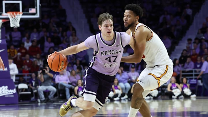 Feb 1, 2026; Manhattan, Kansas, USA; Kansas State Wildcats forward Andrej Kostic (47) dribbles against Iowa State Cyclones forward Joshua Jefferson (5) during the first half at Bramlage Coliseum. Mandatory Credit: Scott Sewell-Imagn Images Feb 1, 2026; Manhattan, Kansas, USA; Kansas State Wildcats forward Andrej Kostic (47) dribbles against Iowa State Cyclones forward Joshua Jefferson (5) during the first half at Bramlage Coliseum. Mandatory Credit: Scott Sewell-Imagn Images