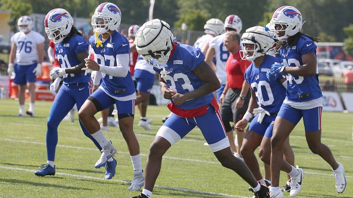 Buffalo Bills' defensive back Te’Cory Couch (33) lunges through warm-ups during the second day of Bills' training camp at St. John Fisher University on Thursday, July 24, 2025 in Pittsford, New York. Buffalo Bills' defensive back Te’Cory Couch (33) lunges through warm-ups during the second day of Bills' training camp at St. John Fisher University on Thursday, July 24, 2025 in Pittsford, New York.