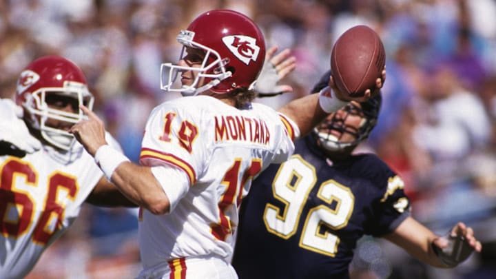 Oct 17, 1993; San Diego, CA, USA; FILE PHOTO; Kansas City Chiefs quarterback Joe Montana (19) and Ricky Siglar (66) in action against San Diego Chargers defensive end Burt Grossman (92) at Jack Murphy Stadium. Mandatory Credit: Peter Brouillet-USA TODAY NETWORK 