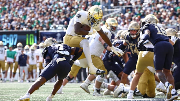 Oct 26, 2024; East Rutherford, New Jersey, USA;  Notre Dame Fighting Irish running back Jeremiyah Love (4) rushes for a touchdown during the first half against the Notre Dame Fighting Irish at MetLife Stadium. Mandatory Credit: Vincent Carchietta-Imagn Images