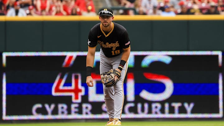 Sep 22, 2024; Cincinnati, Ohio, USA; Pittsburgh Pirates third baseman Jared Triolo (19) prepares for the pitch in the second inning against the Cincinnati Reds at Great American Ball Park. Mandatory Credit: Katie Stratman-Imagn Images