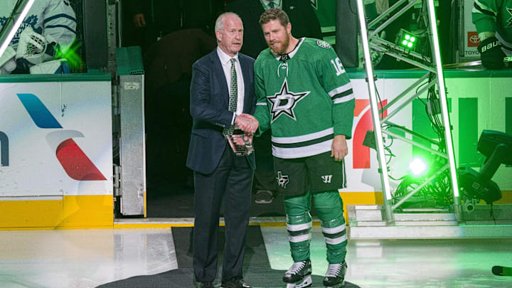 Oct 26, 2023; Dallas, Texas, USA; The Dallas Stars and general manager Jim Nill honor center Joe Pavelski (16) for scoring his 1,000 career NHL point in a ceremony before the game between the Dallas Stars and the Toronto Maple Leafs at the American Airlines Center. Mandatory Credit: Jerome Miron-Imagn Images Oct 26, 2023; Dallas, Texas, USA; The Dallas Stars and general manager Jim Nill honor center Joe Pavelski (16) for scoring his 1,000 career NHL point in a ceremony before the game between the Dallas Stars and the Toronto Maple Leafs at the American Airlines Center. Mandatory Credit: Jerome Miron-Imagn Images