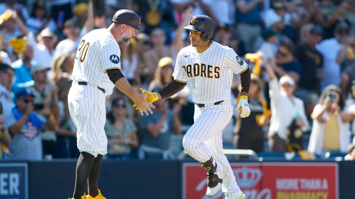Mar 26, 2026; San Diego, California, USA; San Diego Padres left fielder Ramon Laureano (5) celebrates with third base coach Bob Henley (20) after hitting a one run home run during the seventh inning against the Detroit Tigers at Petco Park. Mandatory Credit: David Frerker-Imagn Images Mar 26, 2026; San Diego, California, USA; San Diego Padres left fielder Ramon Laureano (5) celebrates with third base coach Bob Henley (20) after hitting a one run home run during the seventh inning against the Detroit Tigers at Petco Park. Mandatory Credit: David Frerker-Imagn Images