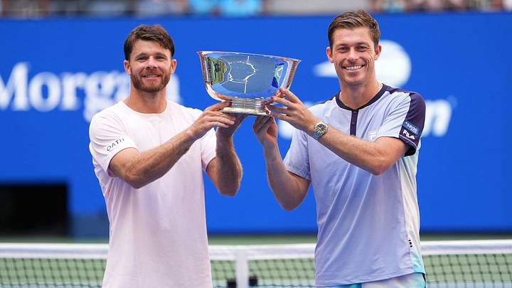 Christian Harrison and Neal Skupski celebrate with the trophy after winning their doubles final against Kevin Krawietz and Tim Puetz. Christian Harrison and Neal Skupski celebrate with the trophy after winning their doubles final against Kevin Krawietz and Tim Puetz.