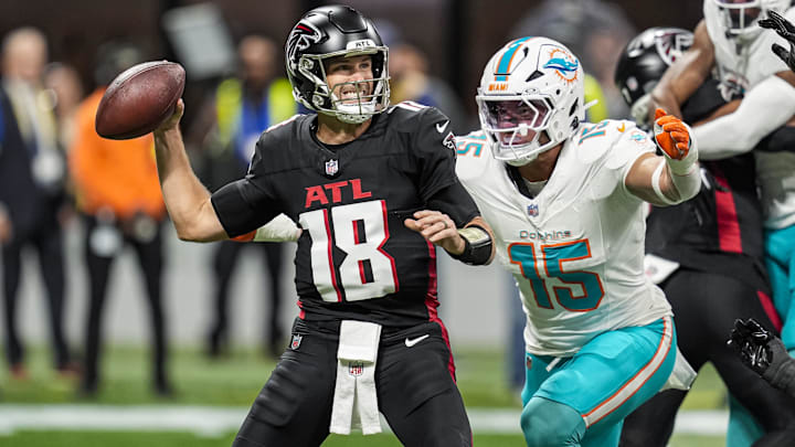 Jaelan Phillips closes in on the blind side of quarterback Kirk Cousins while facing the Falcons. 