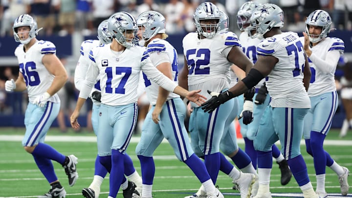 Dallas Cowboys kicker Brandon Aubrey high fives guard Tyler Smith after making a field goal against the New York Giants.